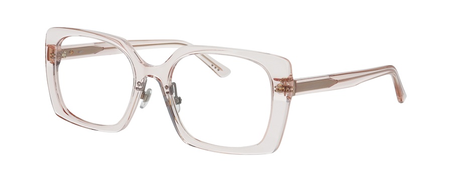 Lunettes Prodesign EDGE en acétate rose poudré transparent, affichant une silhouette féminine audacieuse avec des surfaces raffinées et des détails précis.