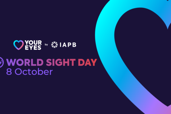 Promotional graphic for World Sight Day on 8 October by IAPB, featuring the "Love Your Eyes" heart-shaped logo and a large, vibrant blue and purple heart design against a dark blue background.