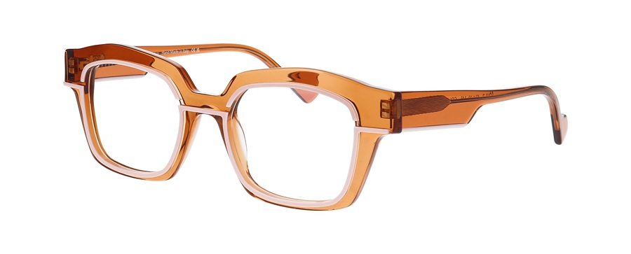 Monture optique FACE À FACE SOUL 2, collection MARKER Automne-Hiver 2026, en acétate transparent brun ambré avec un liseré intérieur rose clair.