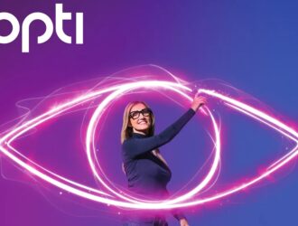 Woman wearing black stylish eyeglasses inside a glowing light neon eye graphic with opti logo on a purple background