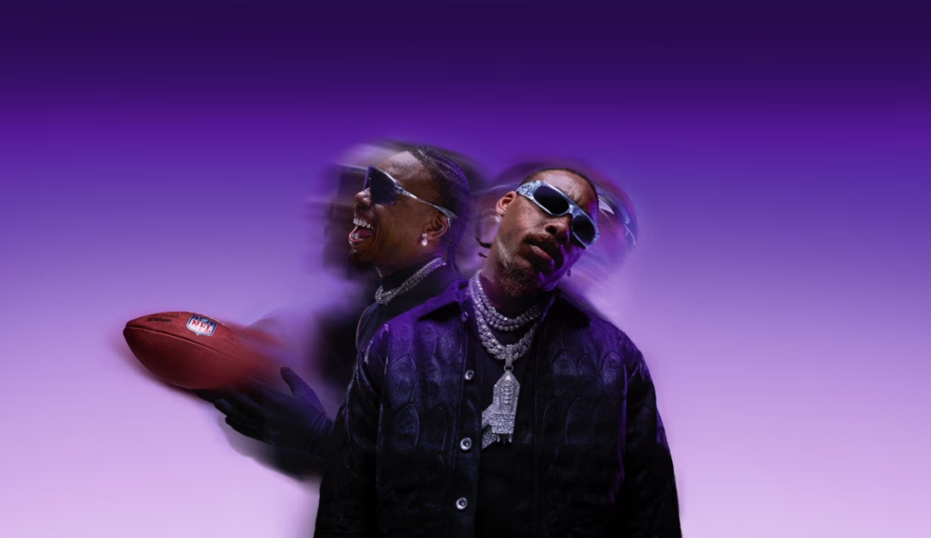 Justin Jefferson holding an NFL football while wearing clear silver-framed Oakley sunglasses in a motion-blur action pose against a purple background.