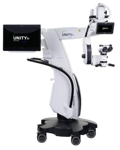 The Alcon UNITY M ophthalmic surgical microscope system, featuring a white mobile wheeled floor stand, an articulated boom arm, dual digital display screens showing the "UNITY M" logo, and a binocular optical head.