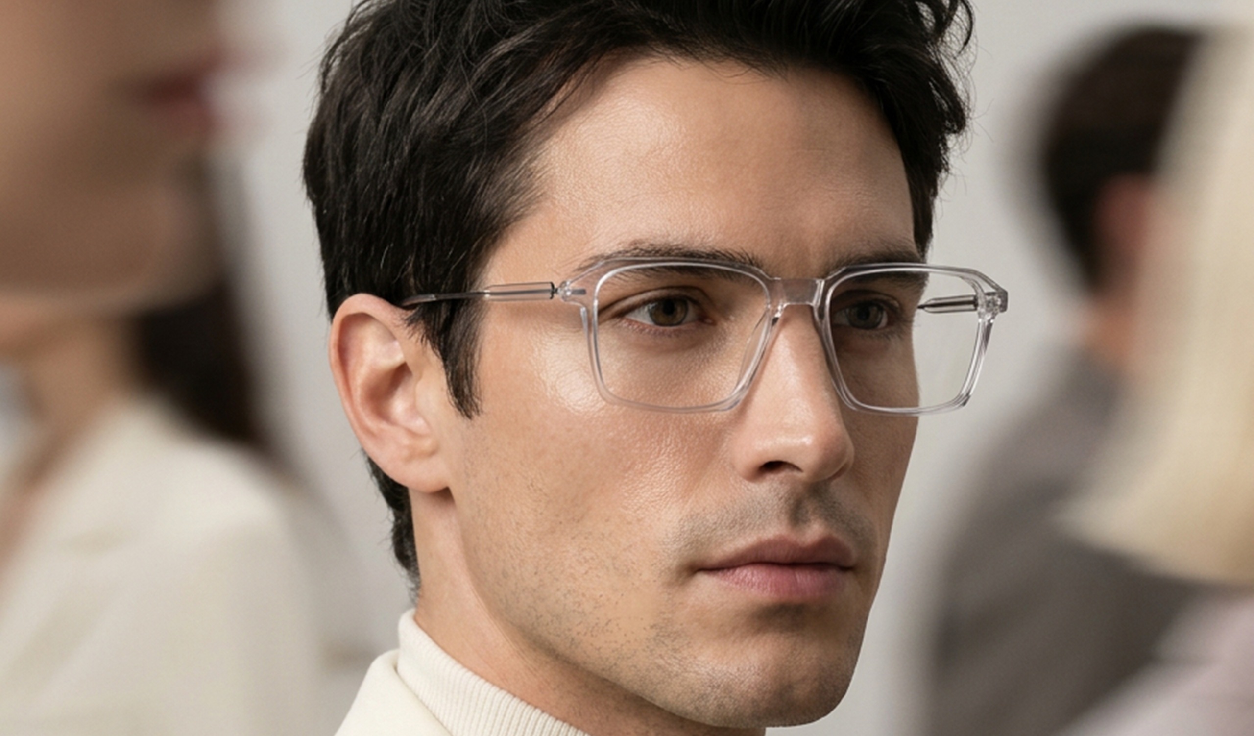 Man wearing LOOK NIL-TECH 75400 lightweight clear transparent rectangular eyeglasses with titanium temples.