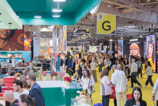 Crowded exhibition hall and brand booths at SILMO Paris optical trade show
