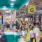 Crowded exhibition hall and brand booths at SILMO Paris optical trade show