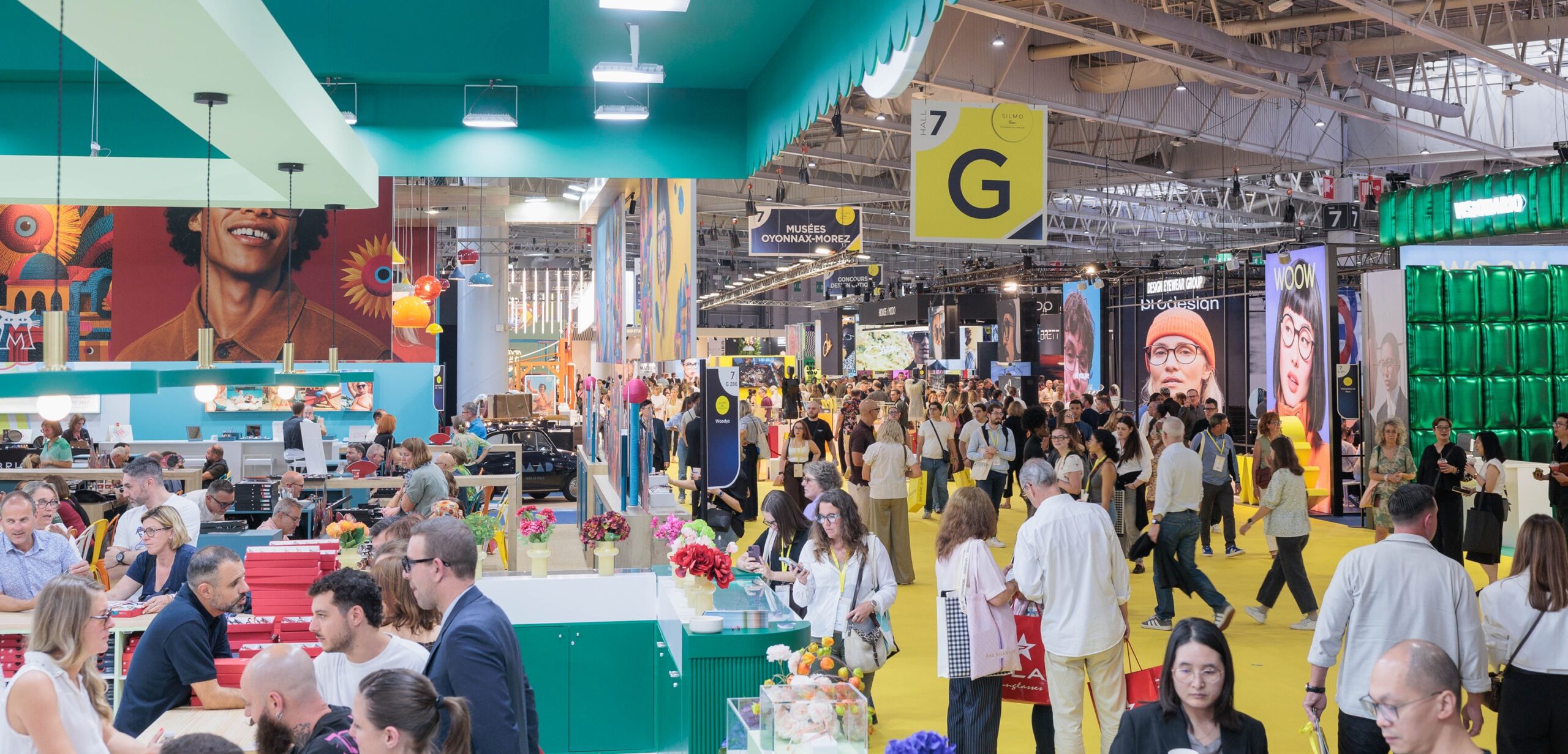 Crowded exhibition hall and brand booths at SILMO Paris optical trade show