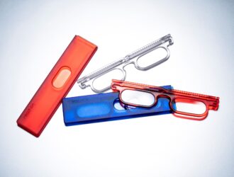 read on bold reading glasses in transparent red, blue and crystal, shown with matching red and blue cases