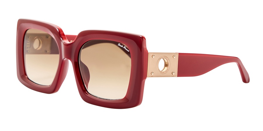 Lunettes de soleil carrées oversize LINDA FARROW Melba en acétate rouge avec détails dorés sur les branches.