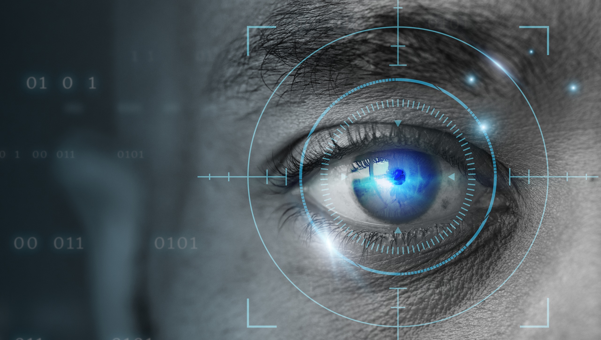 A close-up of a man's eye overlaid with a glowing blue digital targeting reticle and binary code, representing biometric retinal scanning technology.